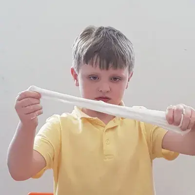 Child playing with slime