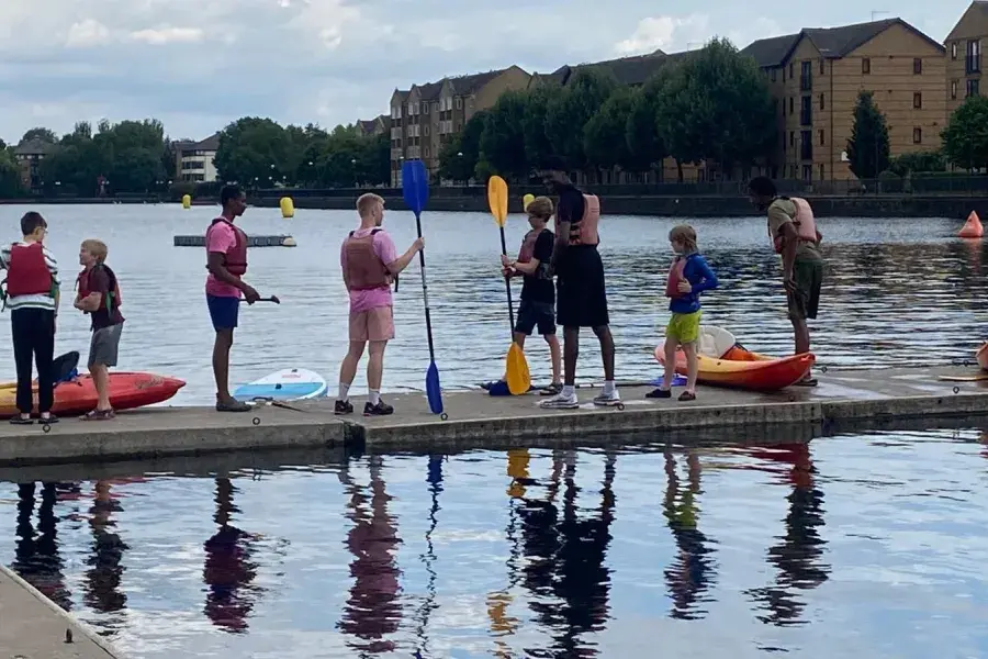 Young People on a pontoon before Kayaking with NDFH
